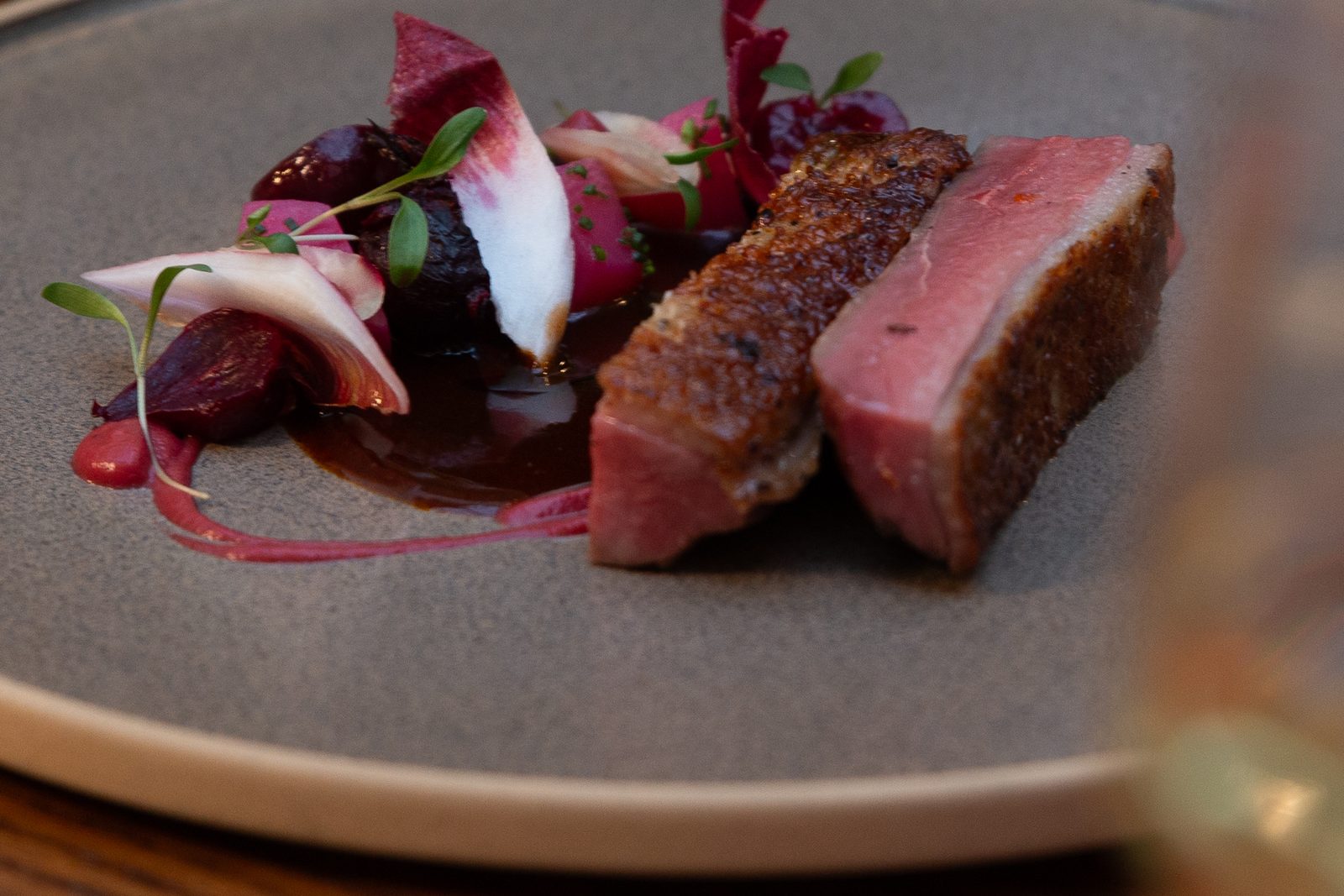 Gressingham duck with heritage beetroot, cherry and chicory